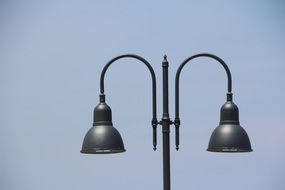 metal lantern for street lighting against a clear sky
