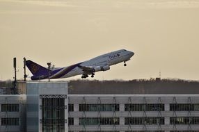 passenger plane above the building