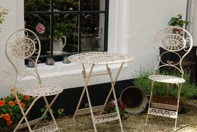 Picture of Chairs and table in a garden