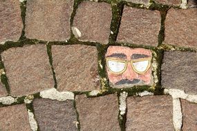 Painting on a Paving Stone