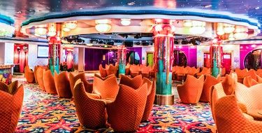 tables and chairs on a cruise ship