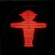 red lights in the shape of a man