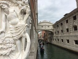 statue near the Bridge of Sighs in venice
