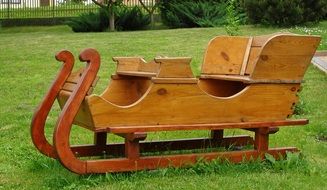 Wooden Sled on green lawn