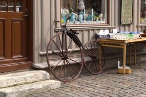 vintage bicycle on pavement at shop display, germany, Gothenburg