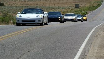 corvette cars on the road