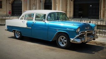 Beautiful shining blue and white Chevrolet in Havana in Cuba