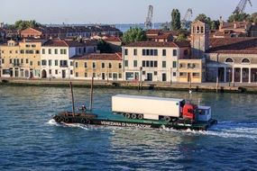 ferry on the water channel in venice