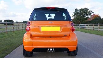 rear view on orange smart car