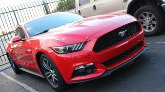 Red Mustang car parked