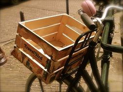 Wooden basket on a bike on a street