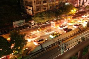 cars at night on thai street