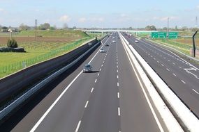 Cars on a Asphalt Highway road