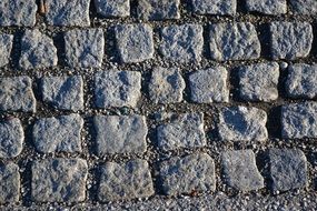 Stone cubes on the road