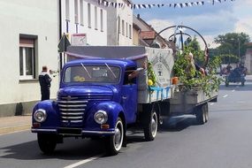 Old truck with a platform on the road