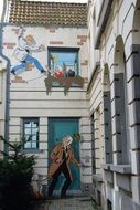 cartoon character like graffiti on a house