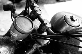 black and white photo of a retro motorcycle engine