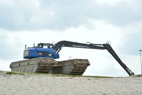 Excavator on the Beach