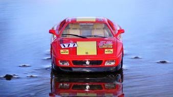 red racing car as a miniature model