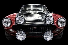 vintage fiat on the black background