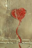 Drawn red heart on the wall