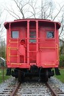 Picture of red Train on a railroad