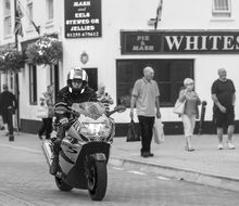 motorcyclist on a city street in england