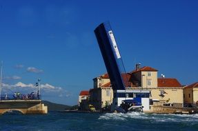 boat under the bridge in croatia