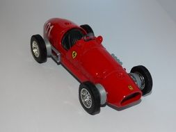 Vintage red miniature of Ferrari car