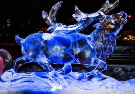 transparent figure of a deer made of ice
