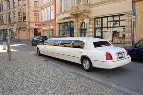 White limousine on the road