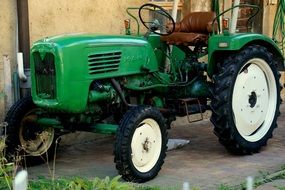 Green tractor on the ranch