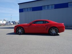 Beautiful red car with the aluminium wheels in Sweden