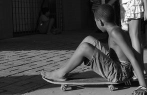 boy on a skateboard in the middle of the street