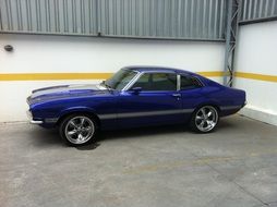 Blue style Maverick car in the garage