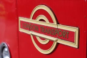 London transport as a sign on a vintage car