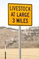 Livestock At Large 3 miles road sign