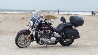 beautiful vintage motorcycle on a sandy beach
