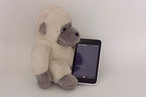 plush monkey and phone