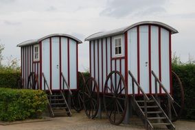two wooden wagons near the Baltic Sea