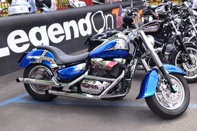 Harley Davidson motorbike with the black and blue details