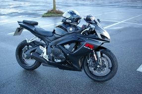 Black Suzuki motorcycle on the road