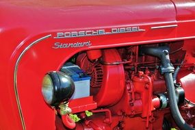 red historical tractor close-up