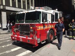 Red Firefighter Car in city, usa, New York