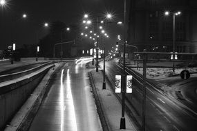 Black and white photo of a night road in Prague