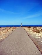 flat road to the lighthouse on the island of Formentera