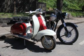 scooter and motorcycle in the parking lot