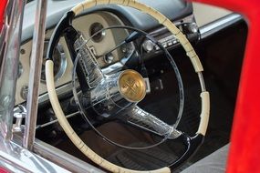 view of the wheel of a classic car