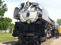 freight train on rails on a sunny day