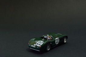 vintage green car with number 